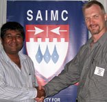 Ralf Hesse (right) being thanked by Vinesh Nundkishaw